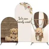 Teddy bear plush toy with brown fur, white belly, and a basket design on its back.